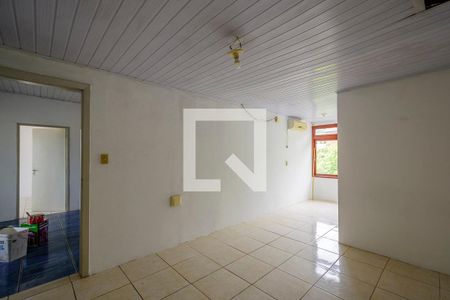 Suíte de casa de condomínio à venda com 3 quartos, 400m² em Vila Nova, Porto Alegre