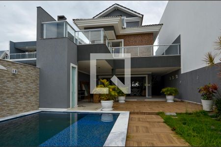 Casa de condomínio à venda com 484m², 6 quartos e 4 vagasÁrea externa