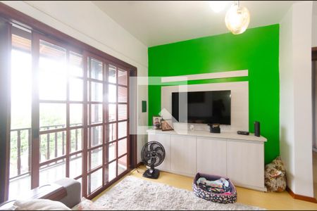 Sala de casa à venda com 3 quartos, 180m² em Vila Nova, Porto Alegre