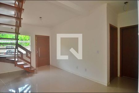 Sala de casa de condomínio para alugar com 3 quartos, 124m² em Harmonia, Canoas