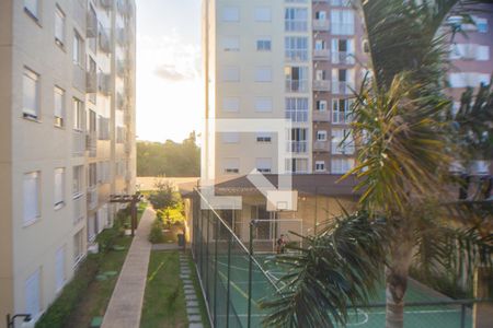 Vista da suite de apartamento à venda com 2 quartos, 58m² em Vila Nova, Porto Alegre