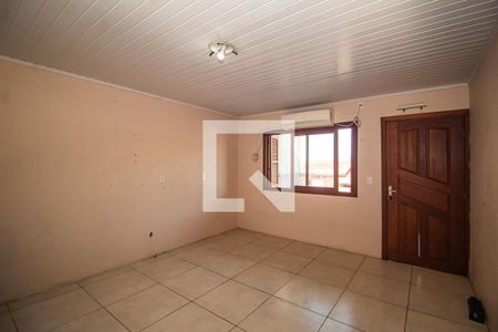 Sala de casa à venda com 3 quartos, 98m² em Vila Nova, Porto Alegre
