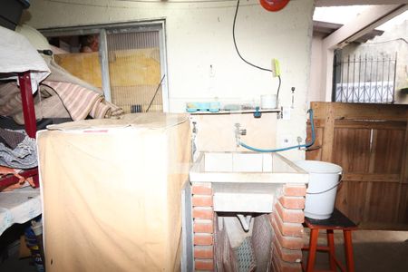 Casa à venda com 330m², 4 quartos e 6 vagasLavanderia Casa 1