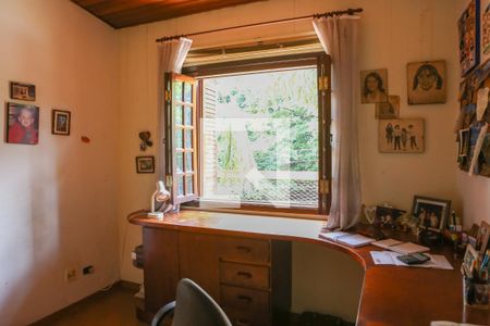 Casa à venda com 450m², 4 quartos e 4 vagasEscritório da Suíte 1