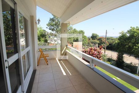 Sacada da Sala de casa à venda com 3 quartos, 201m² em Espírito Santo, Porto Alegre