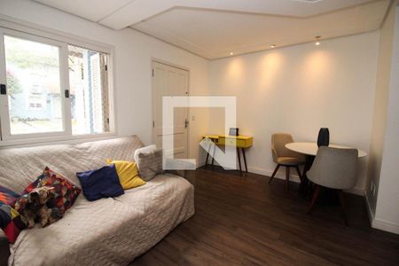 Sala de casa de condomínio à venda com 3 quartos, 123m² em Vila Nova, Porto Alegre