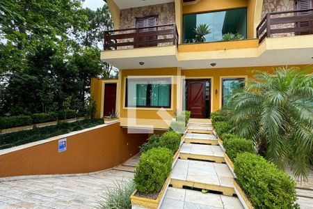 Casa de condomínio para alugar com 480m², 4 quartos e 6 vagasFachada