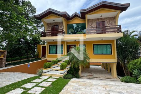 Casa de condomínio para alugar com 480m², 4 quartos e 6 vagasFachada