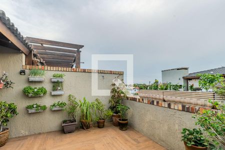 Sala de casa de condomínio à venda com 2 quartos, 102m² em Guarujá, Porto Alegre