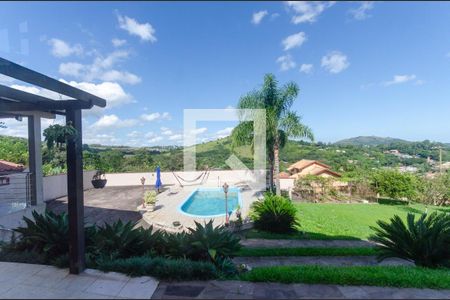 Vista da Sala de casa à venda com 3 quartos, 249m² em Vila Nova, Porto Alegre