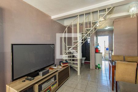 Sala de casa de condomínio à venda com 2 quartos, 45m² em Rio Branco, Canoas