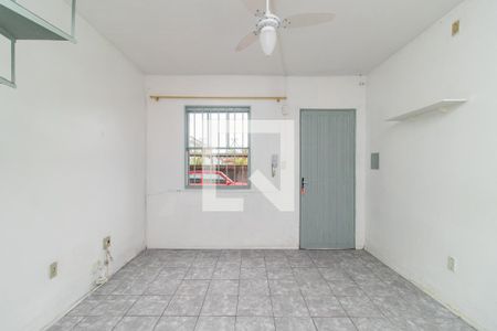Sala de casa de condomínio à venda com 2 quartos, 70m² em Coronel Aparicio Borges, Porto Alegre