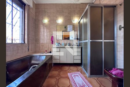 Casa à venda com 405m², 4 quartos e 4 vagasBanheiro Suíte 