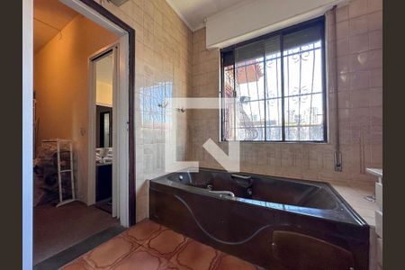 Casa à venda com 405m², 4 quartos e 4 vagasBanheiro Suíte 