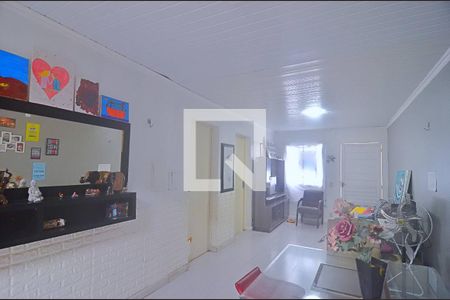 Sala de casa de condomínio à venda com 2 quartos, 70m² em Mato Grande, Canoas
