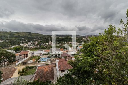 Vista de casa à venda com 3 quartos, 130m² em Jardim Carvalho, Porto Alegre