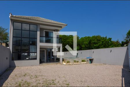 Casa de condomínio à venda com 420m², 4 quartos e 6 vagasÁrea externa