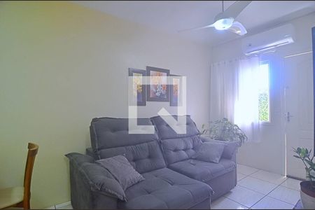 Sala de casa de condomínio à venda com 2 quartos, 50m² em Niterói, Canoas