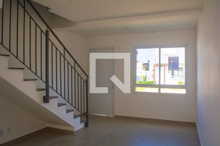 Sala de casa de condomínio para alugar com 2 quartos, 87m² em Vila Nova, Porto Alegre