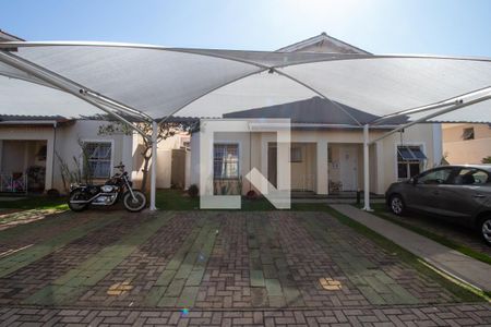 Casa de condomínio para alugar com 115m², 3 quartos e 2 vagasFachada e garagem