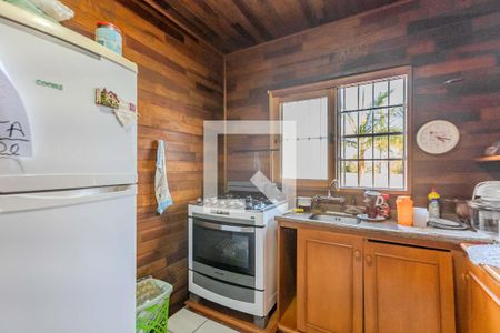 Casa à venda com 120m², 4 quartos e 2 vagas Casa à venda com 120m², 4 quartos e 2 vagasCozinha e Área de Serviço