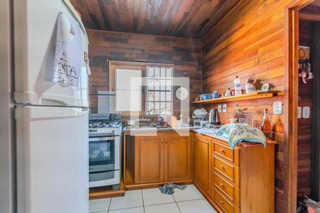 Casa à venda com 120m², 4 quartos e 2 vagas Casa à venda com 120m², 4 quartos e 2 vagasCozinha e Área de Serviço