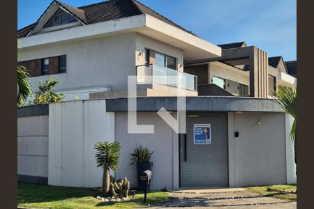 Casa de condomínio à venda com 350m², 4 quartos e 3 vagasFachada