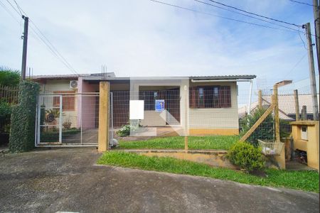 Casa à venda com 82m², 3 quartos e 2 vagas Casa à venda com 82m², 3 quartos e 2 vagasFachada