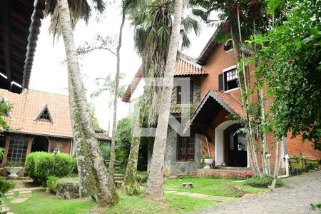 Casa de condomínio para alugar com 1350m², 4 quartos e 7 vagasFachada
