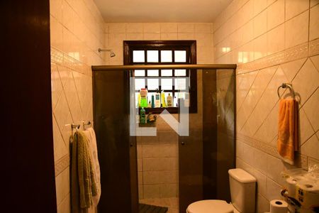 Casa de condomínio para alugar com 1350m², 4 quartos e 7 vagasBanheiro social