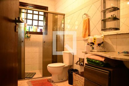 Casa de condomínio para alugar com 1350m², 4 quartos e 7 vagasBanheiro social