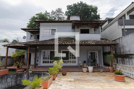 Casa de condomínio à venda com 440m², 4 quartos e 4 vagasFachada
