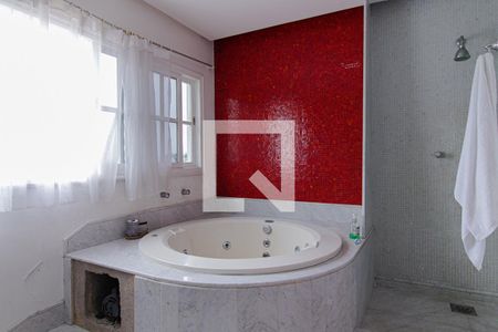 Casa de condomínio à venda com 440m², 4 quartos e 4 vagasBanheiro Quarto 1