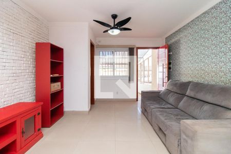 Sala de casa para alugar com 3 quartos, 122m² em Guarujá, Porto Alegre