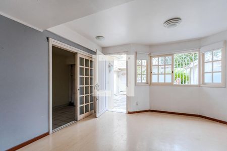Sala de casa de condomínio à venda com 3 quartos, 124m² em Ipanema, Porto Alegre