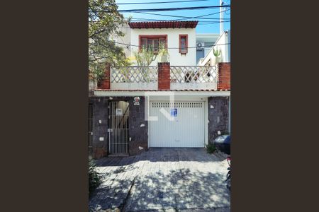 Casa à venda com 167m², 3 quartos e 2 vagas Casa à venda com 167m², 3 quartos e 2 vagasFachada externa