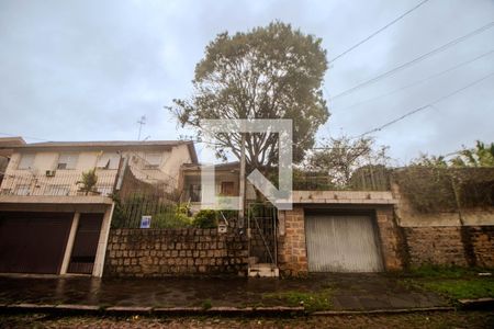 Fachada de casa à venda com 4 quartos, 990m² em Jardim Sabará, Porto Alegre