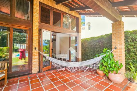 Casa de condomínio para alugar com 390m², 4 quartos e 8 vagasVaranda