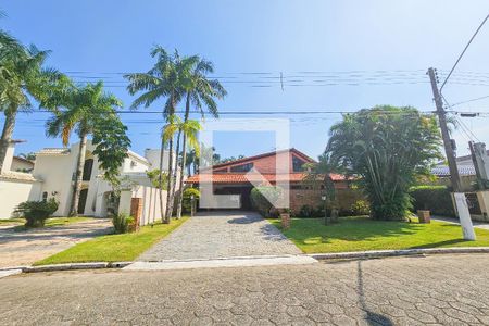 Casa de condomínio para alugar com 390m², 4 quartos e 8 vagasFachada