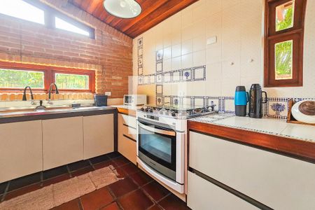 Casa de condomínio para alugar com 390m², 4 quartos e 8 vagasCozinha