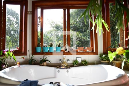 Casa de condomínio para alugar com 300m², 4 quartos e 3 vagasBanheiro da Suíte 1