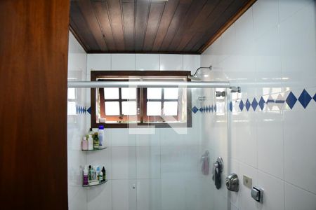 Casa de condomínio para alugar com 300m², 4 quartos e 3 vagasBanheiro da Suíte 2