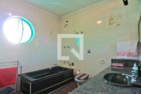 Casa à venda com 310m², 4 quartos e 2 vagasBanheiro da Suíte