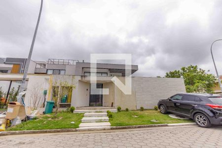 Casa de condomínio à venda com 720m², 4 quartos e 4 vagasFachada