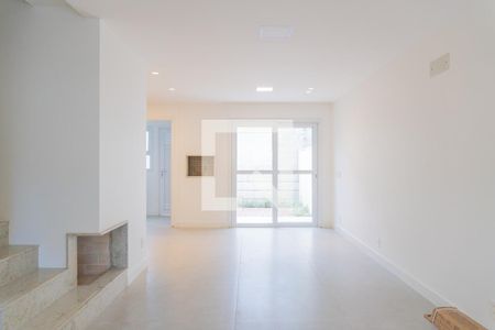 Sala de casa de condomínio à venda com 3 quartos, 155m² em Vila Nova, Porto Alegre