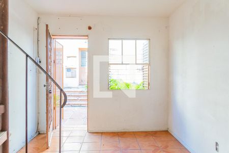 Sala de casa de condomínio à venda com 1 quarto, 60m² em São José, Porto Alegre