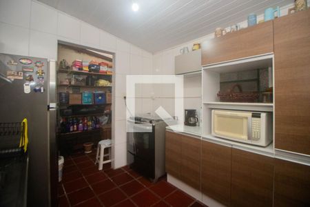 Casa à venda com 70m², 3 quartos e sem vaga Casa à venda com 70m², 3 quartos e sem vagaCozinha e Área de Serviço