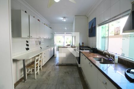 Casa de condomínio para alugar com 350m², 4 quartos e 4 vagasCozinha