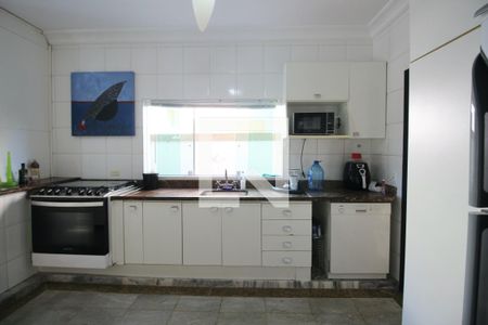 Casa de condomínio para alugar com 350m², 4 quartos e 4 vagasCozinha