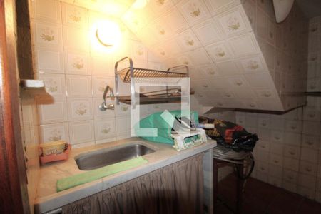 Casa de condomínio à venda com 480m², 4 quartos e 3 vagasCozinha da churrasqueira